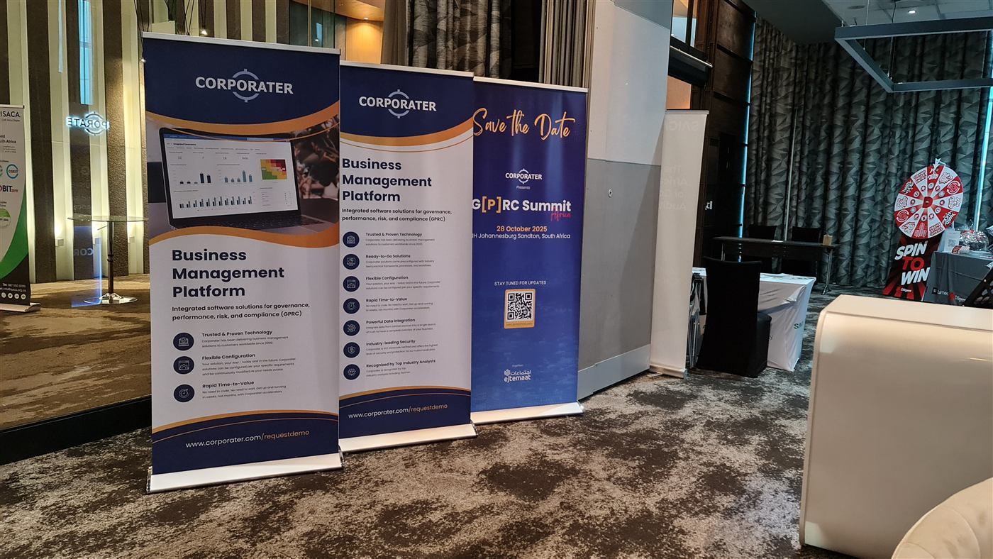 Corporater branded pull-up banners at a conference
