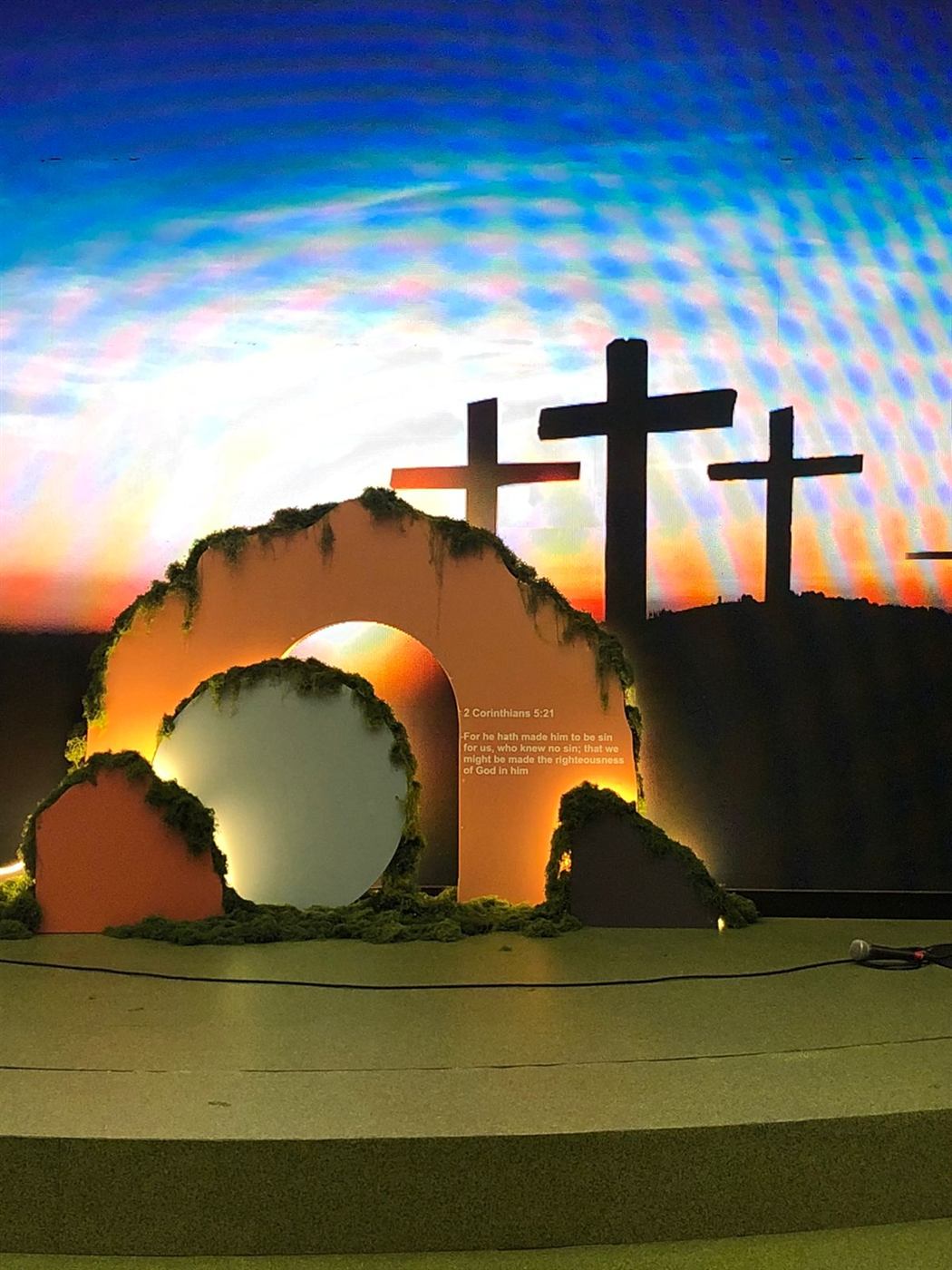 Easter stage set backdrop with empty tomb and crosses