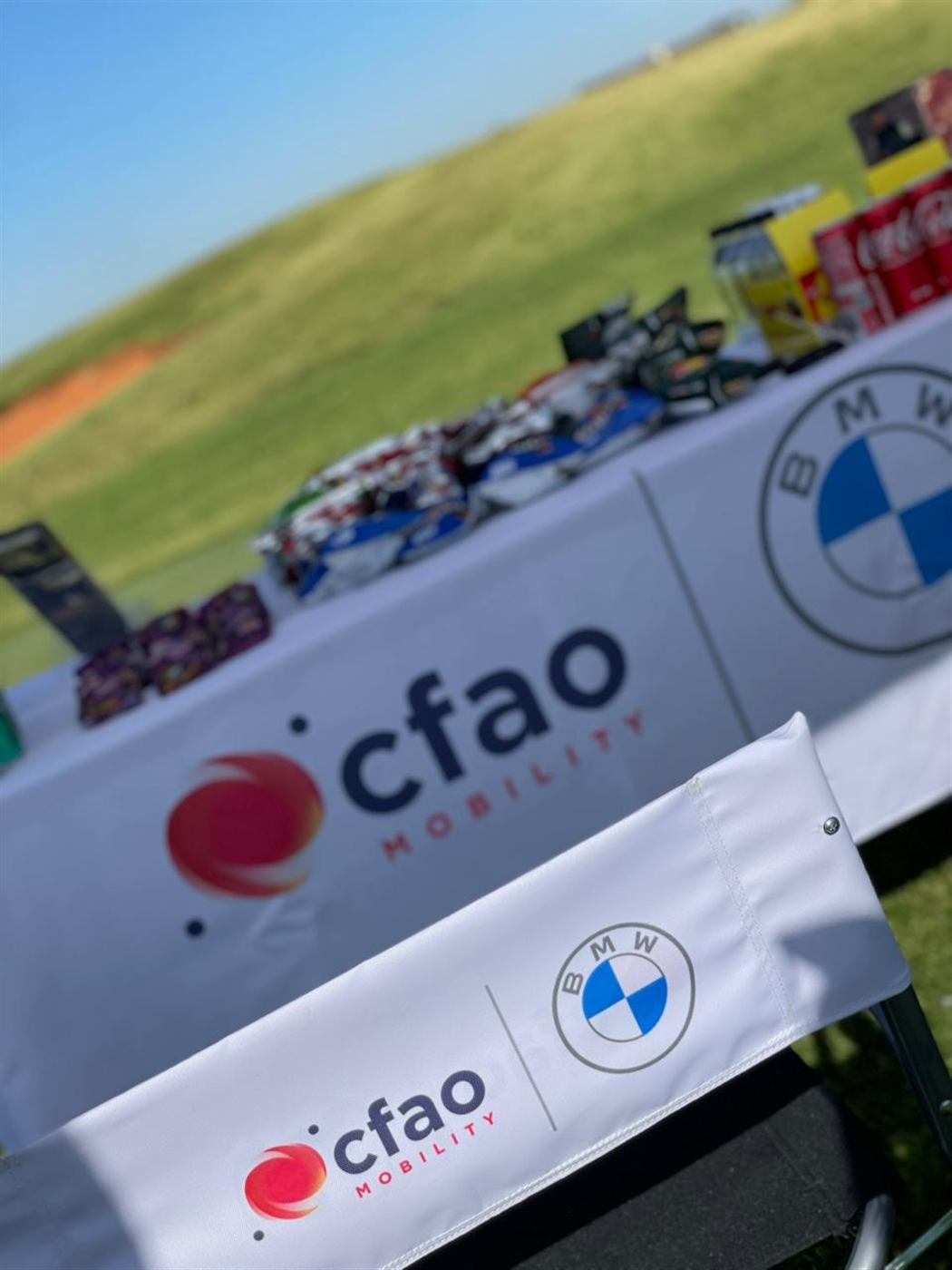 CFAO Mobility and BMW branded table throw at an outdoor event