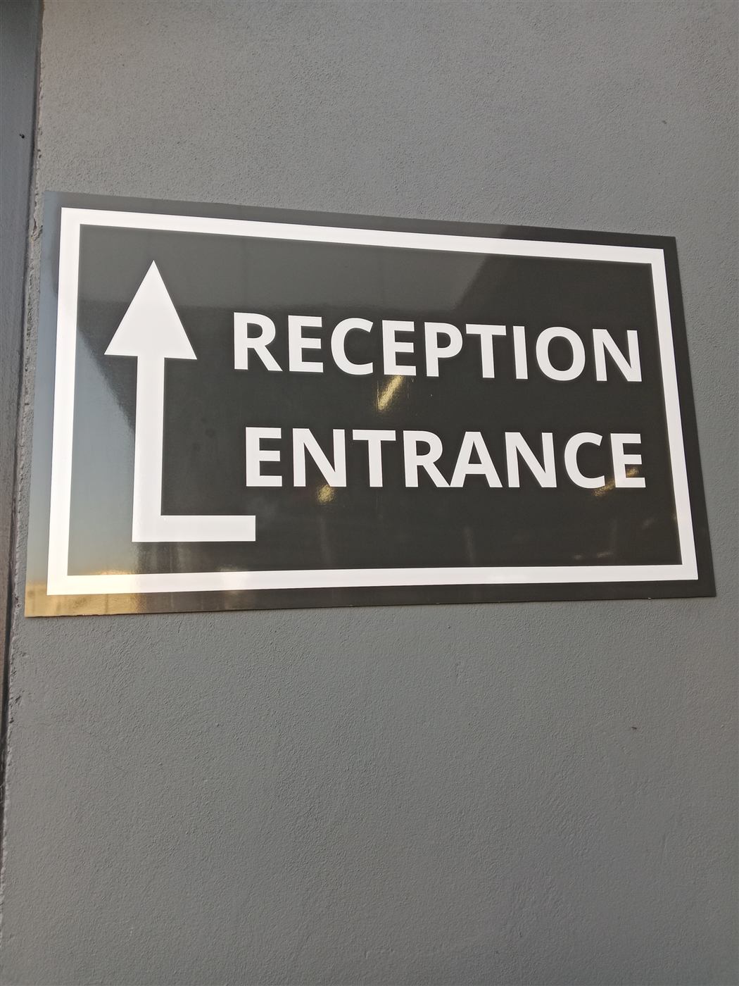 Reception entrance directional wall signage