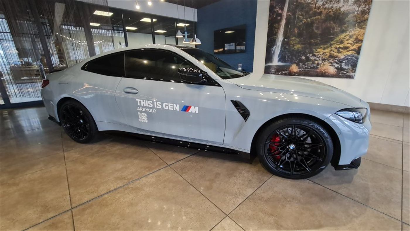 Precision cut vinyl decal applied to a showroom vehicle